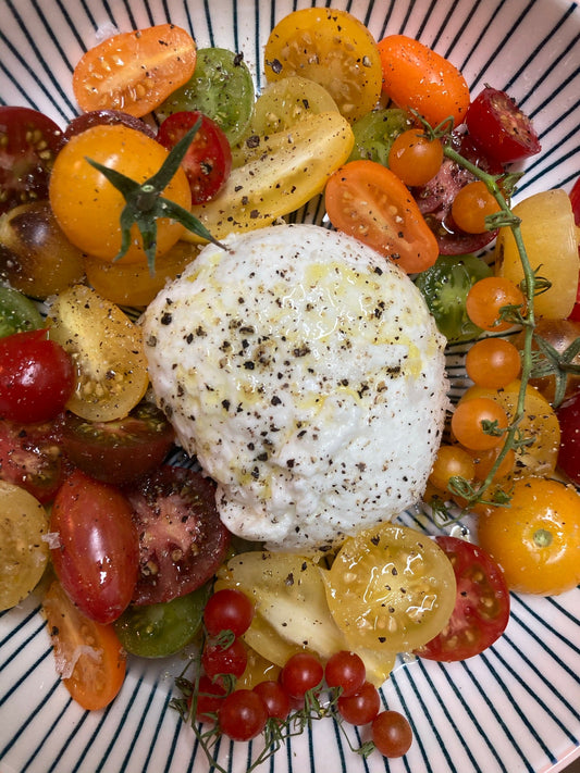 Burrata con tomates